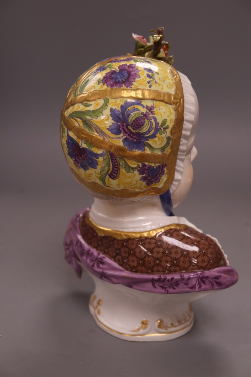 A 19th century Meissen bust of a Bourbon child, height 25cm